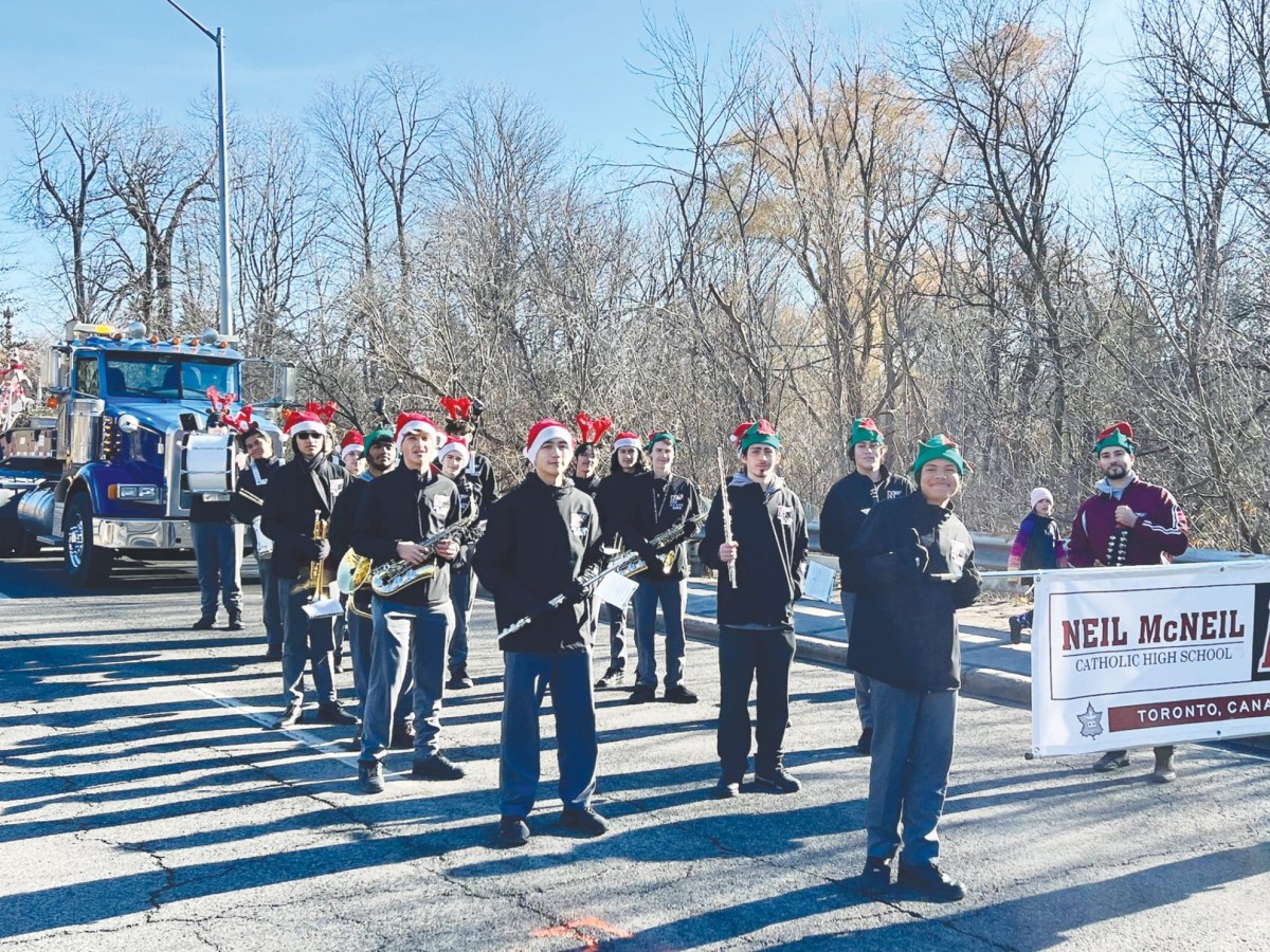 Neil Helps Neil McNeil’s Marching Band helps welcome Santa at pair of parades ...
