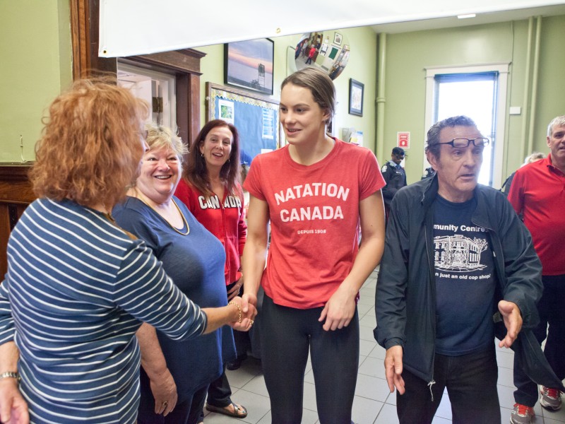 Olympic multi-medalist Penny Oleksiak greets fans and staff at Community Centre 55 on October 15.