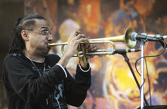 Brownman solos over the backing of his Electryc Trio during the Beaches International Jazz Festival’s streetfest portion. Tens of thousands of music lovers flocked to the Beach over the course of 10 days of music, food and fun for the 26th annual festival. PHOTO: Jon Muldoon