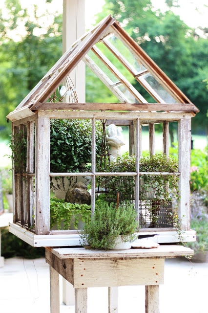 An example of a small greenhouse built from reclaimed windows. PHOTO: erin-artandgardens.blogspot.com