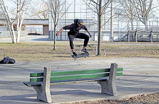 Skateboarder Harrison Robinson ollies in Kew Gardens on April 24. It was a sunny, 13°C day that seemed to jump a whole season ahead from the wintry scene on April 15. PHOTOS: Andrew Hudson