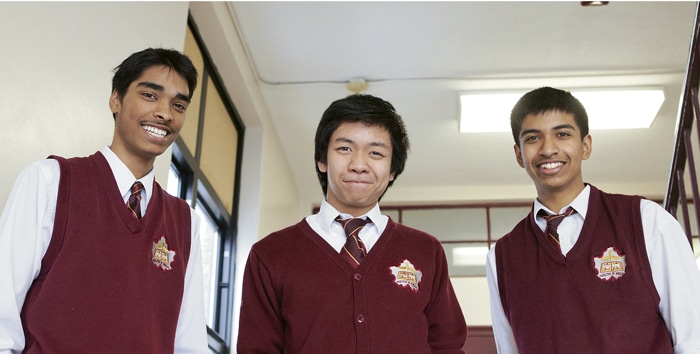 Neil McNeil Grade 11 students Tamim Chowdhury, left, Enrique Olivo, centre, and Gowttam Perinpanayagam placed fourth in a student business competition. PHOTO: Phil Lameira / Beach Metro News